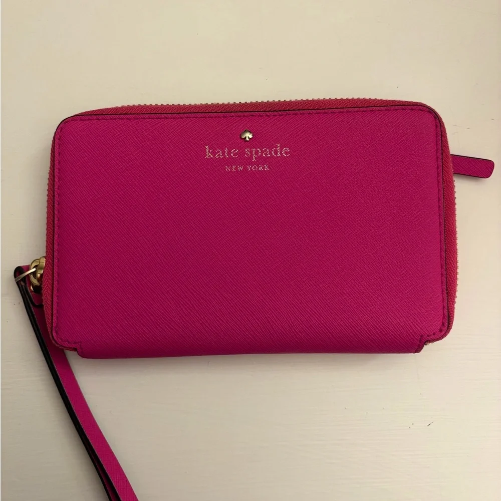 kate spade fuchsia zip-around wristlet wallet